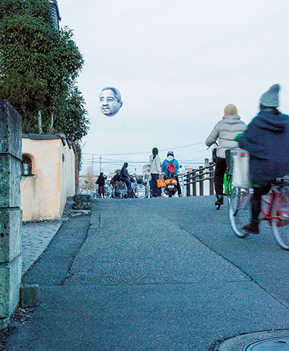 Day with a Man’s Face Floating in the Sky